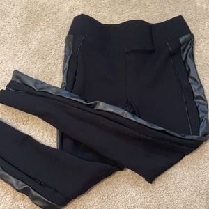 Black leggings with leather strip on side